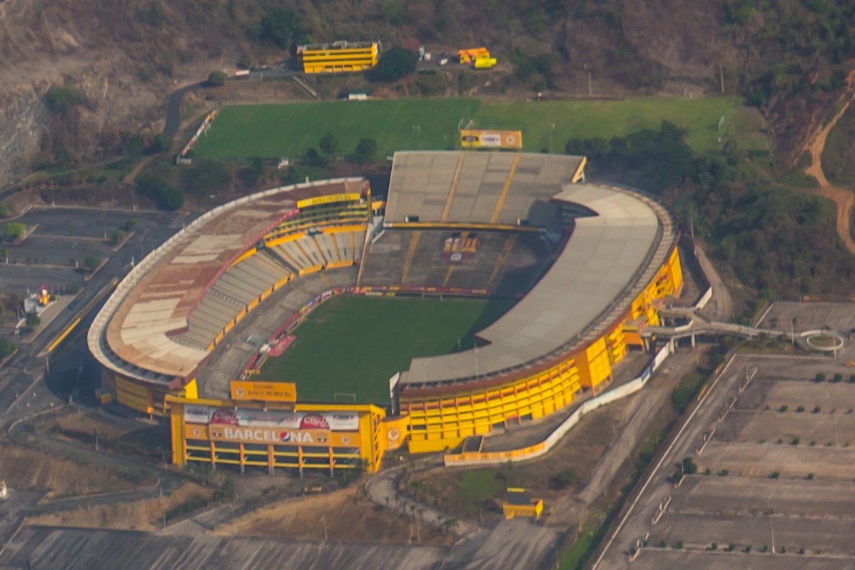Aerial view of the yellow Estadio Monumental Banco Pichincha in Guayaquil